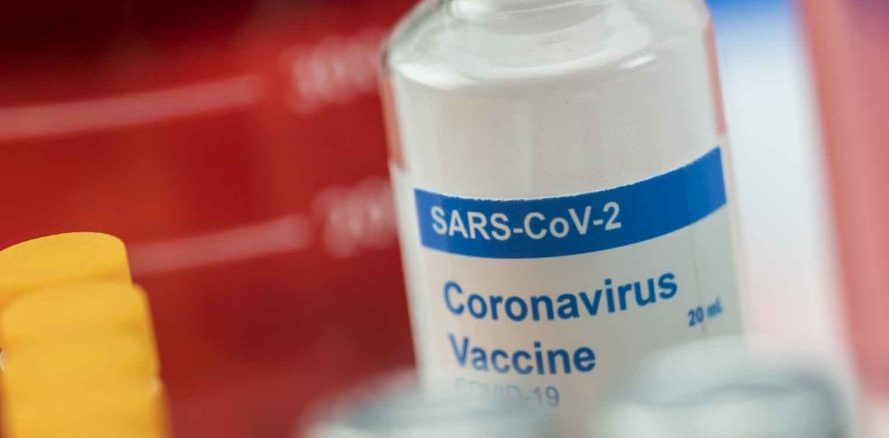 Coronavirus covid-19 experimental vaccine in a laboratory, conceptual image, unbranded generic drug containers and hypothetical bar codes