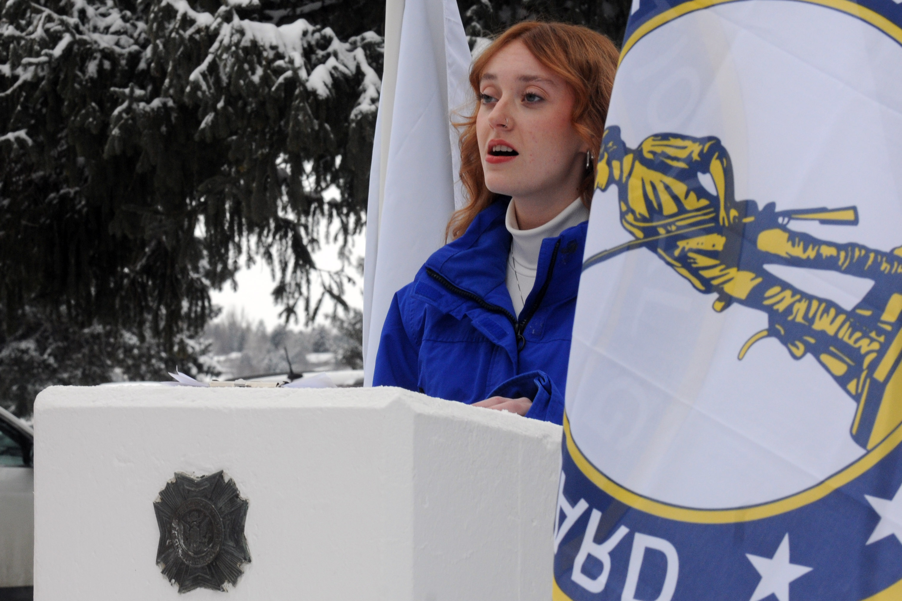 Ryanne Dixon sings The Star-Spangled Banner during the ceremony.