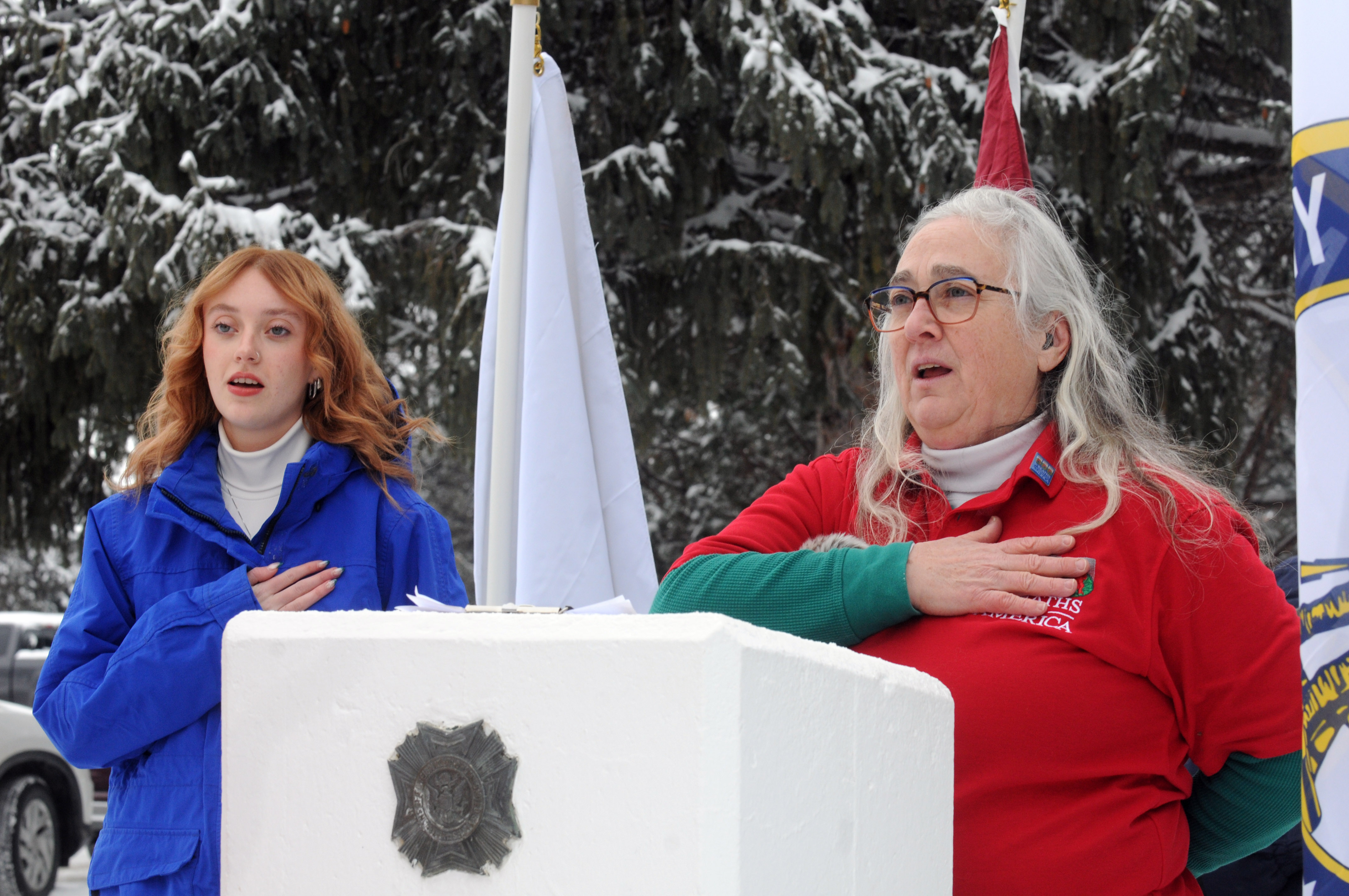 Ryanne Dixon, who sang "The Star-Spangled Banner" and Michelle Parker, recite the Pledge of Allegiance during the ceremony. This was Parker's last year as the organizer. 
