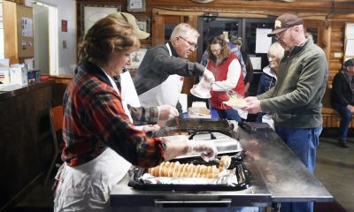 Craig Johnson, vice president, Sheridan County Sportsmen's Association serves spaghetti during the association's annual member spaghetti dinner & meeting Friday, Jan. 9, 2026.
